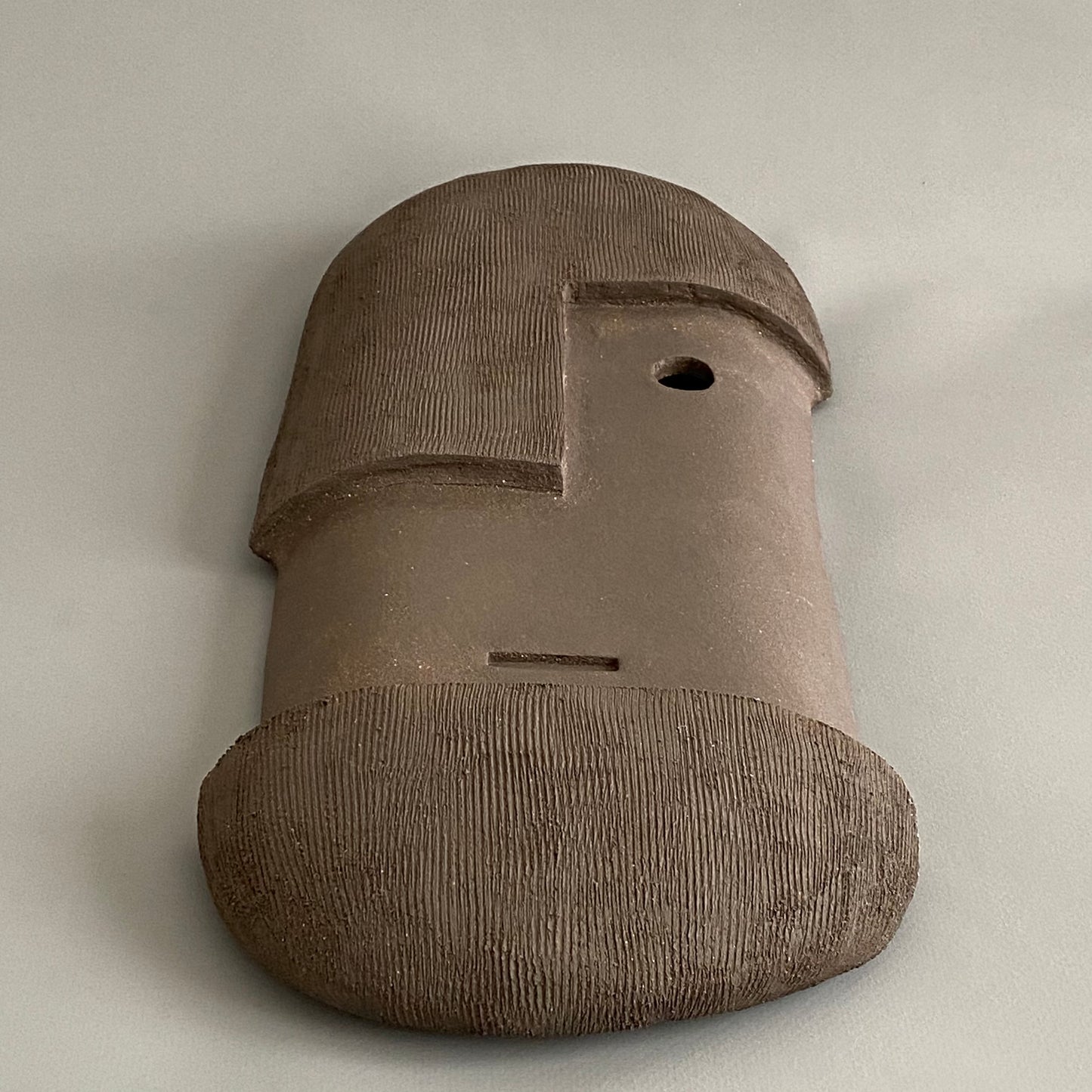 Masque en grès noir