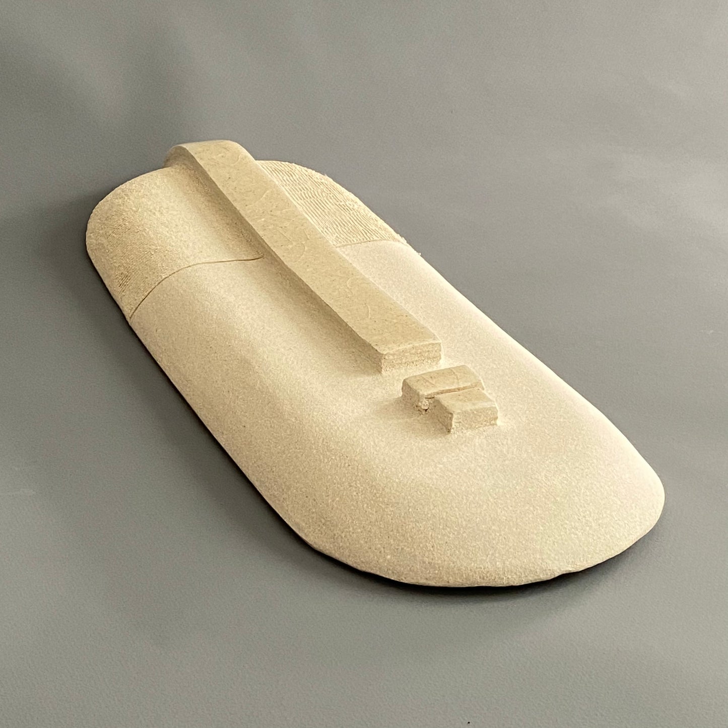 Masque en grès beige mat et brillant