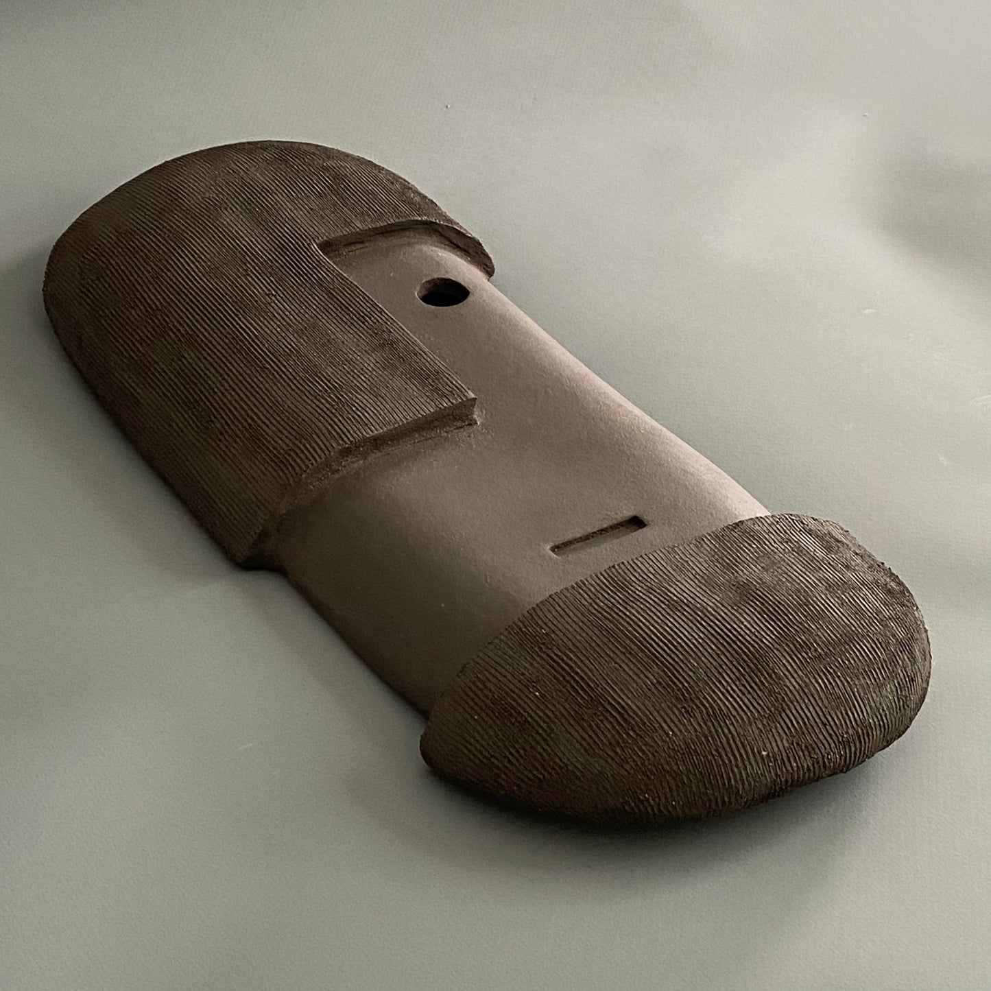 Masque en grès noir